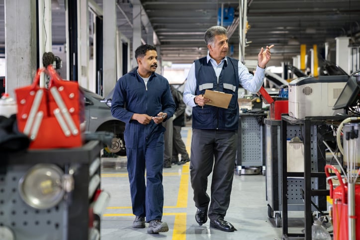 EHS-Mechanic-service-director-walking-shop-GettyImages-2256068375