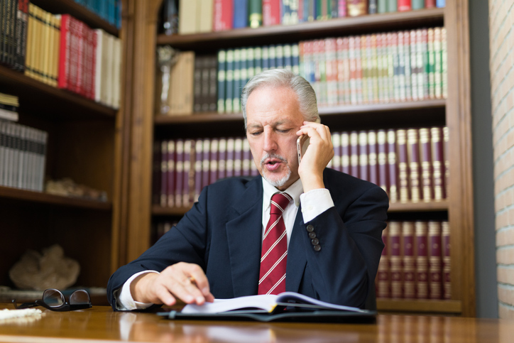 HR-HR-expert-on-phone-hr-hotline-GettyImages-1178304480