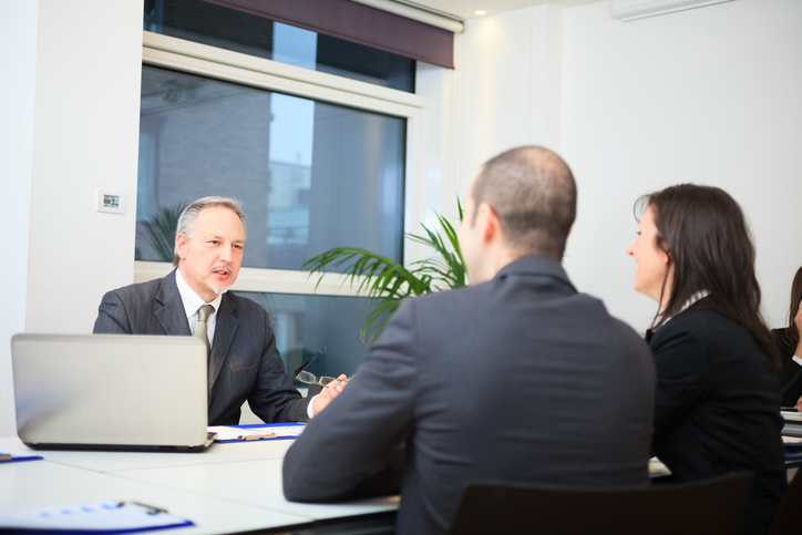 HR-Man-consulting-clients-GettyImages-470001450